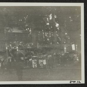 Visitors with umbrella at Chuzenji, Nikko