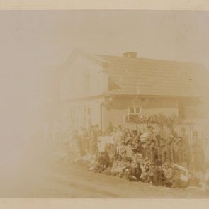 Firemen's band in front of the Hampl house