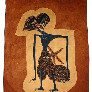 Batikolt textil, wayang figurával