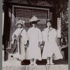 Korean priests outside a shrine