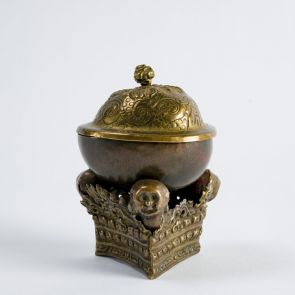 Skull-shaped vessel for holy water