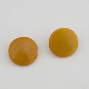 A pair of ornamental buttons