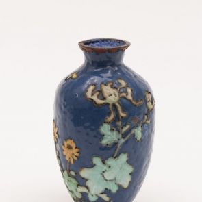 Vase demonstrating the phases of cloisonné enamel technique 6. (filling the compartments)