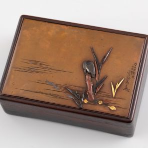 Lidded box with inlaid metal plate on the lid depicting a kingfisher looking for its prey