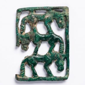 Belt plaque: three horses, one on top of the other, within a border