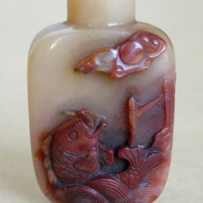 Snuff bottle decorated with a fish jumping from the water