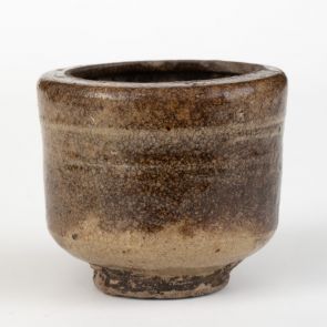 Small bowl with greyish-brownish crackled glaze and inward-curved rim