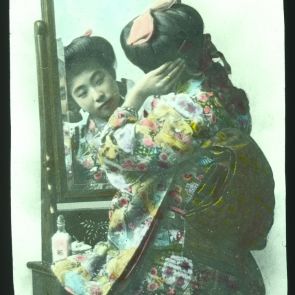 Japanese girl in front of the mirror
