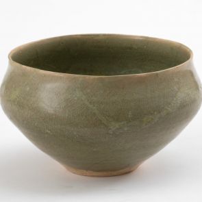 Greenish-brown glazed bowl with funnel