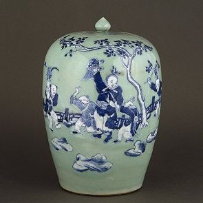Lidded pitcher with the figure of a playing child