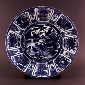 Big plate with floral decoration in radiating panels