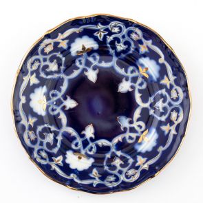 Blue glazed plate with gilding.