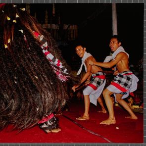 Barong's warriors, enchanted, attack the witch