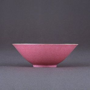 Cup covered with deep pink glaze