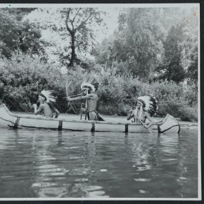 "Manydogs", "Laying Bison" and an arrow-shooting Indian in a canoe