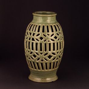 Vase with openworked body and coin decoration