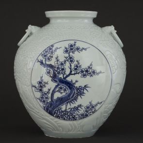 Spherical vase with plum blossom and chrysanthemum motifs