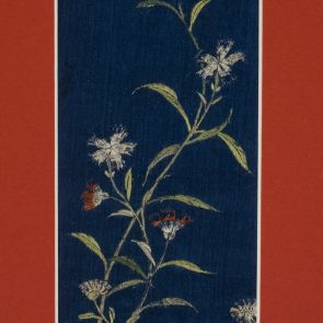Fragment of women's clothes with wild flower motifs