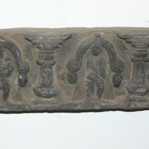 Figures standing under chaitya arches