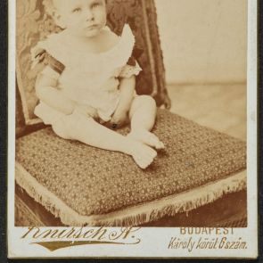 Baby sitting on a chair (Ervin Baktay)