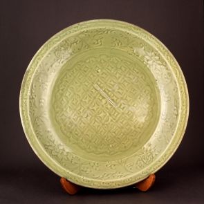 Plate with coin motifs