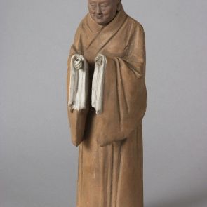 Standing Buddhist monk