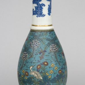 Blue and white porcelain vase with cloisonné decoration and kintsugi repair