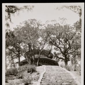A steep staircase leads to a round pavilion on Meishan Hill
