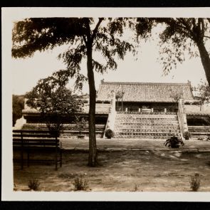 A building behind a nine-step platform in the courtyard of the Temple of Agriculture