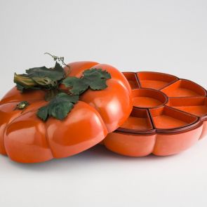 Pumpkin-shaped serving box with eight removable dishes