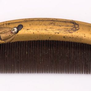 Ornamental comb (sashi-gushi) with nobleman in boat design