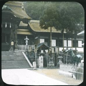The grand bronze temple gate at the Suwa Shrine