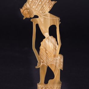 Wayang figurine with pedestal