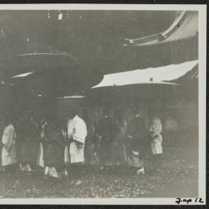 Visitors with umbrella at Chuzenji, Nikko