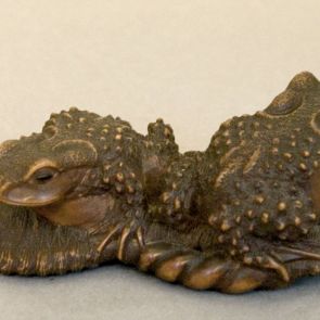 Two big toads on a waraji (straw sandal)
