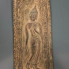 Votive tablet: Walking Buddha