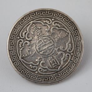 Button made of Chinese silver dollar, 1911