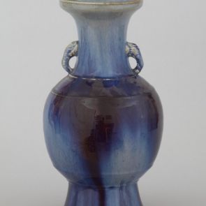 Vase with elephant head handles
