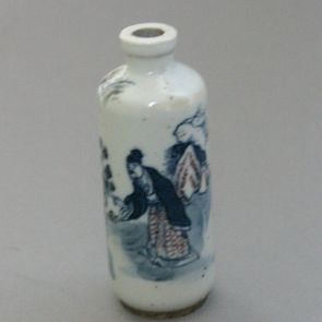 Snuff bottle decorated with the figures of a sitting monk and a scholar bowing in front of him