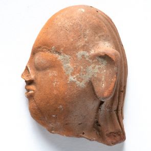 Female head. Fragment.