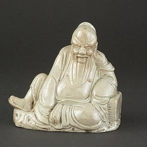 Sitting Taoist deity