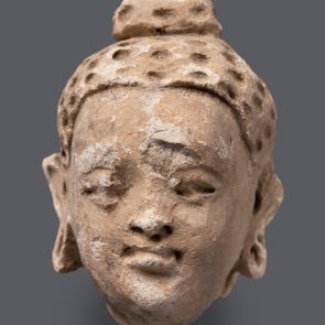 Head of Buddha. Fragment.
