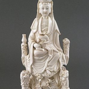 Sitting Guanyin with two attendants