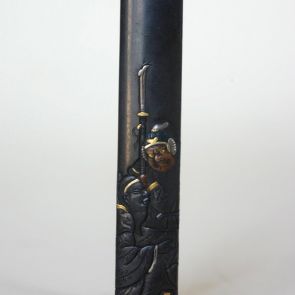 Kozuka handle (handle of a by knife that is part of a sword mounting) decorated with an image of Kan-u, God of war