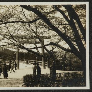 Torii, behind it a wide bridge and people walking, Ise, 1936