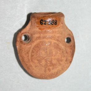 Terracotta amulet holding pendant