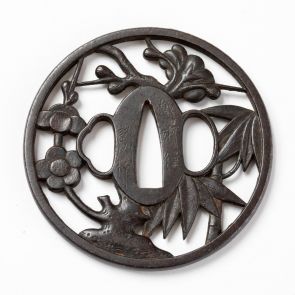 Sword guard (tsuba) with bamboo and prunus pattern