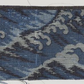 Brocade sample - Cresting waves with middle, light, and dark blue sewing threads
