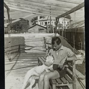 Street photographs: István Klein with a dog