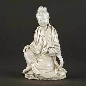 The bodhisattva Guanyin with a ruyi in her hand